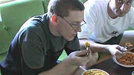 Olly and Tao enjoy their very large rice and pasta meals at our Røyksund B&B